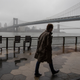 A man walks alone on the promenade under the FDR drive in Lower Manhattan, Sunday, March 29, 2020.